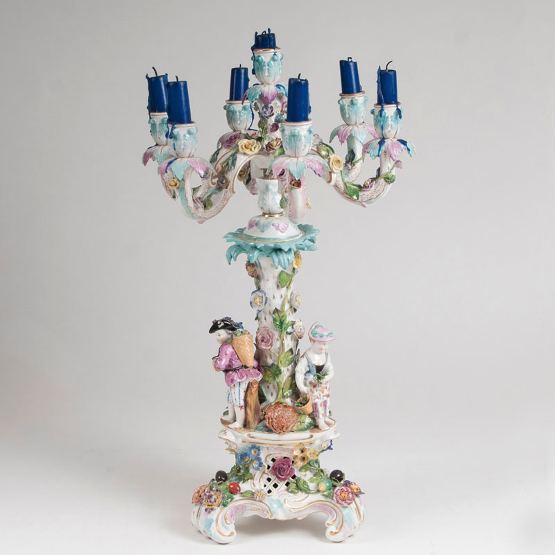 A large decorative porcelain candelabra in rococo style