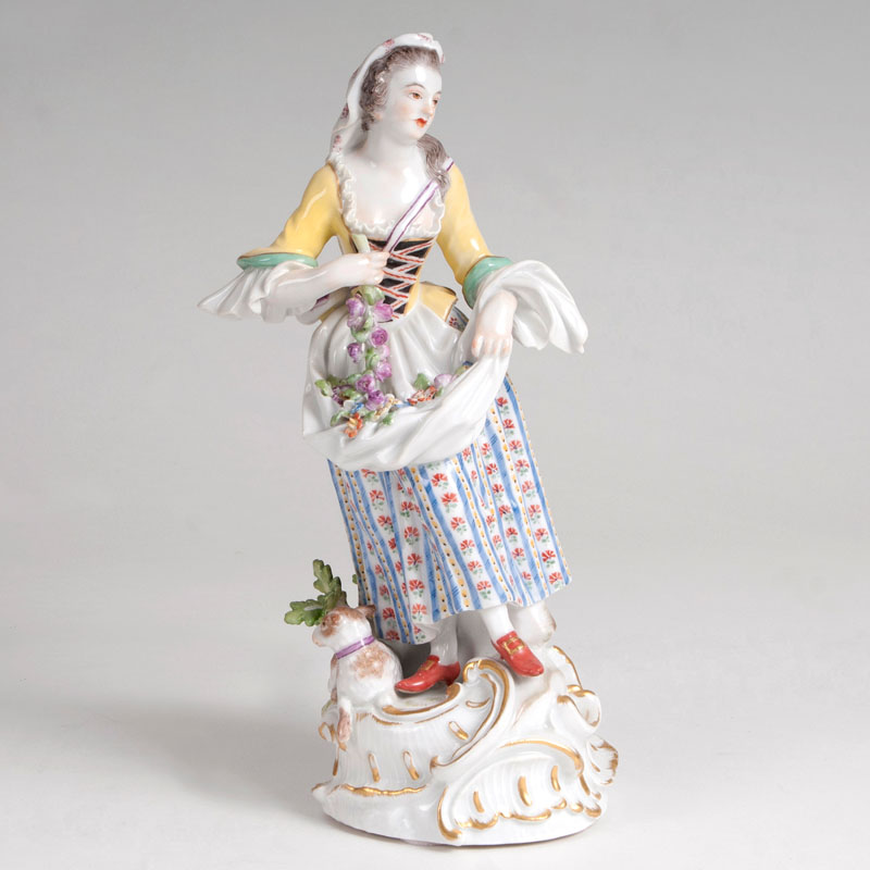 A large porcelain figure 'female gardener'