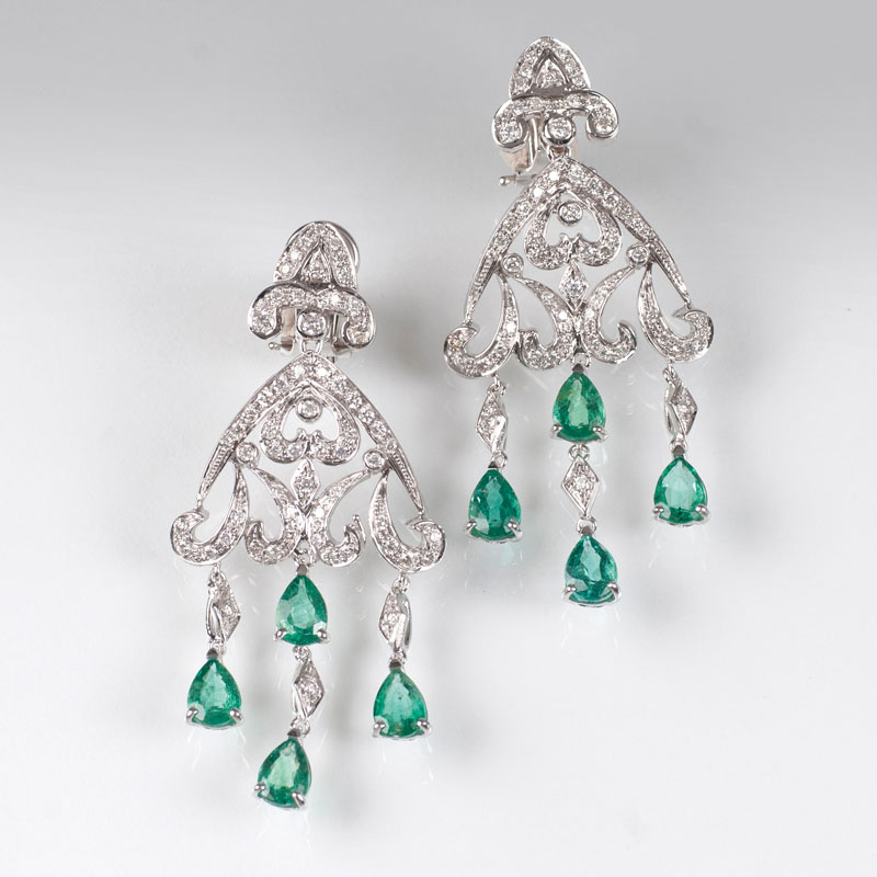 A pair of emerald diamond earchandeliers