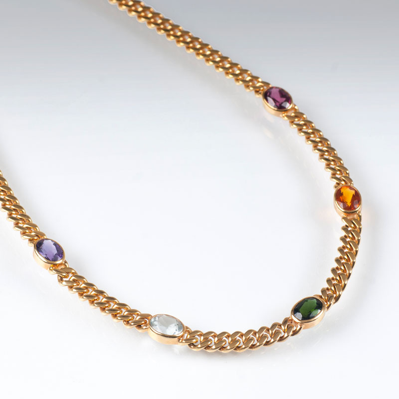 A curb chain necklace with semiprecious stones