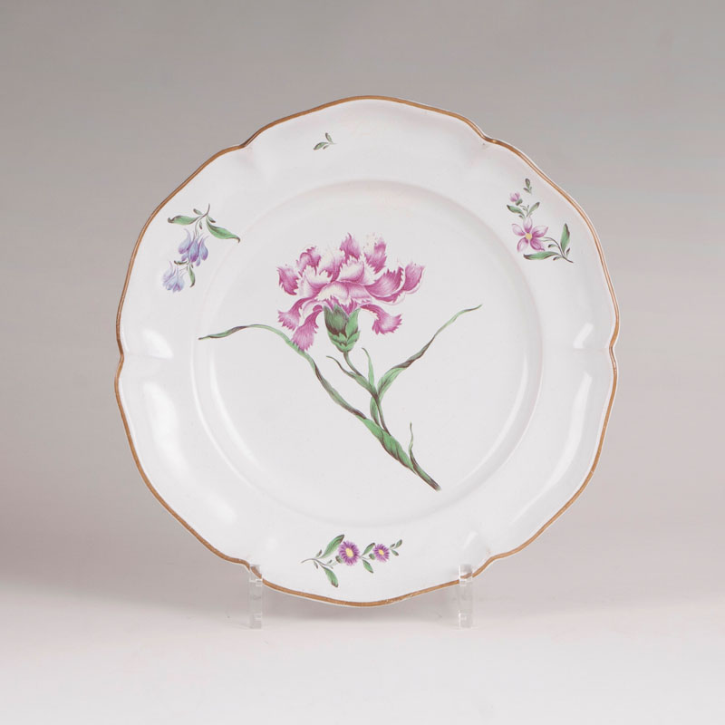 A fayence plate 'fleur esseulée'