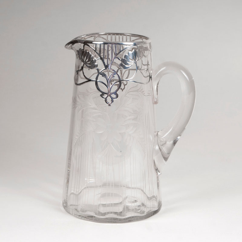 A water pitcher with floral silver inlay