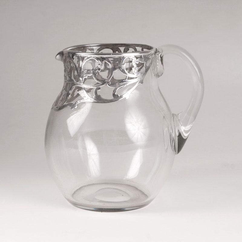 A water pitcher with silver inlay