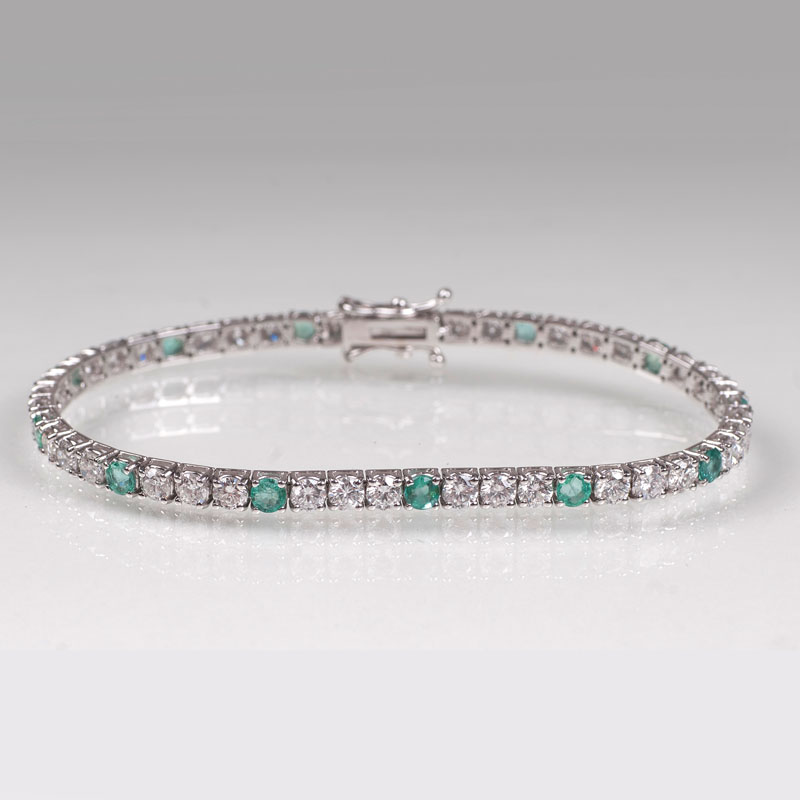 An elegant emerald diamond bracelet