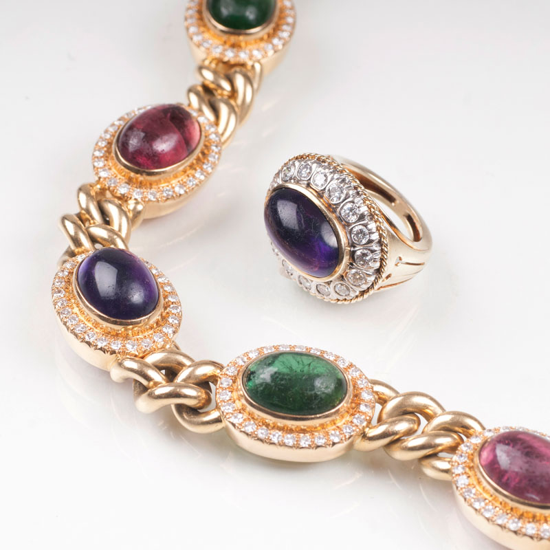 A peridot amethyst jewellery set with bracelet and ring