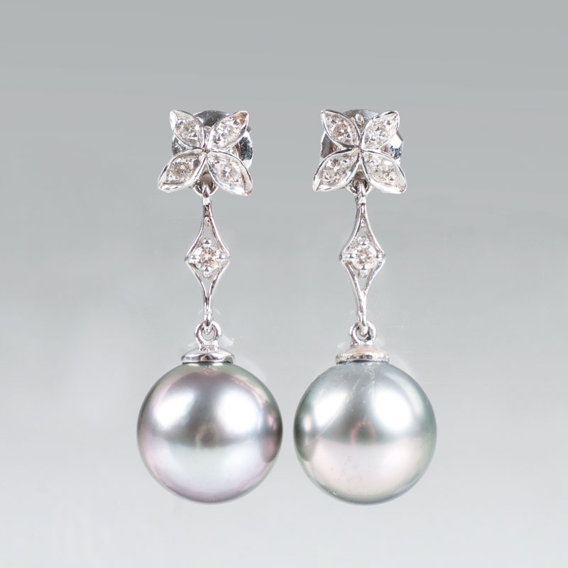 A pair of Tahiti pearl diamond earrings