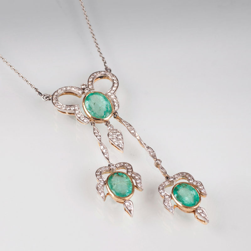 An emerald diamond necklace in the style of Art Nouveau