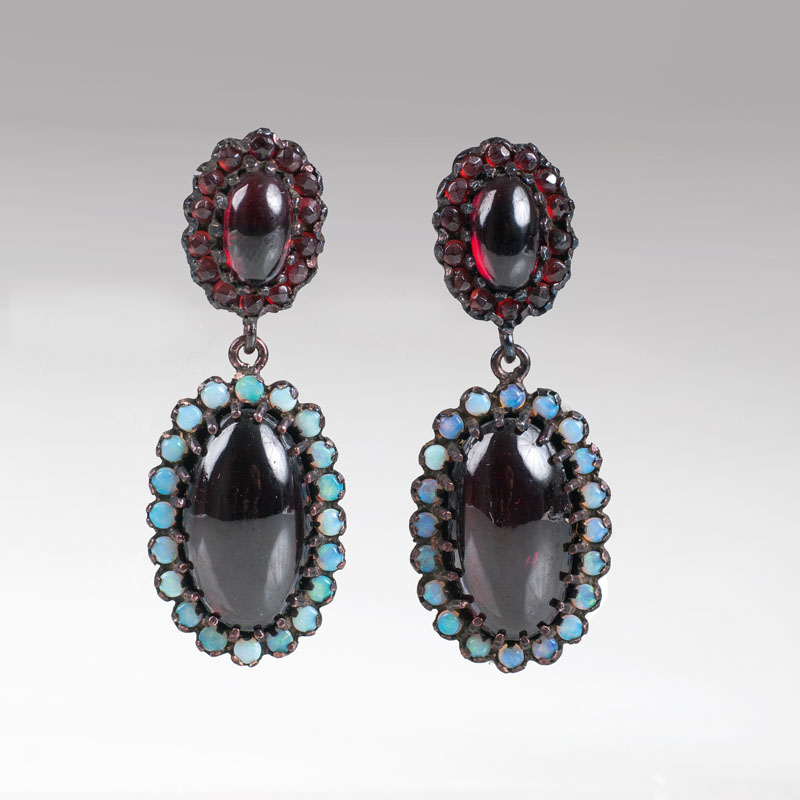 A pair of garnet opal earpendants