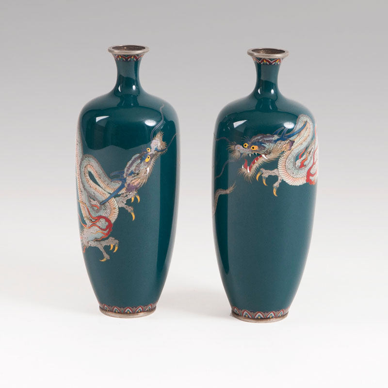 A pair of small narrow neck Cloisonné vases with fine dragon decor