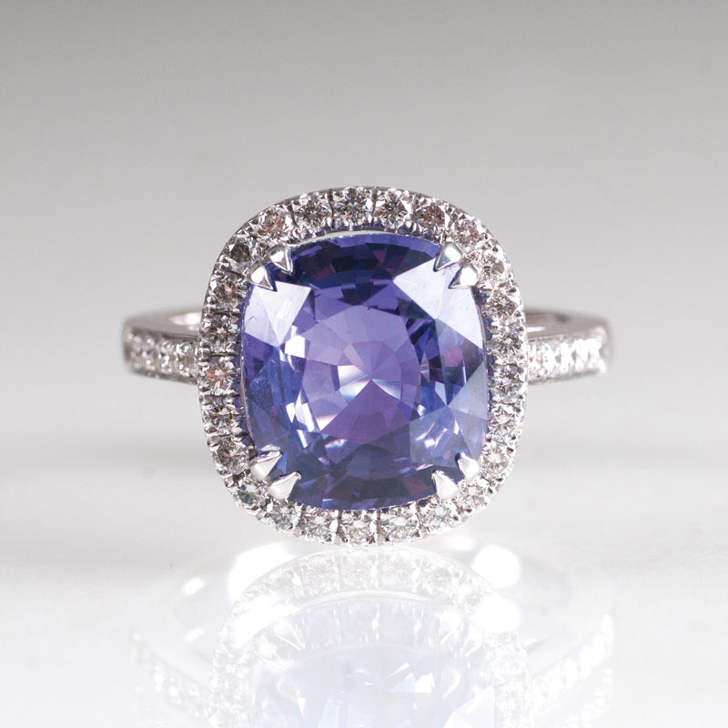 A natural Purple Sapphire ring with diamonds