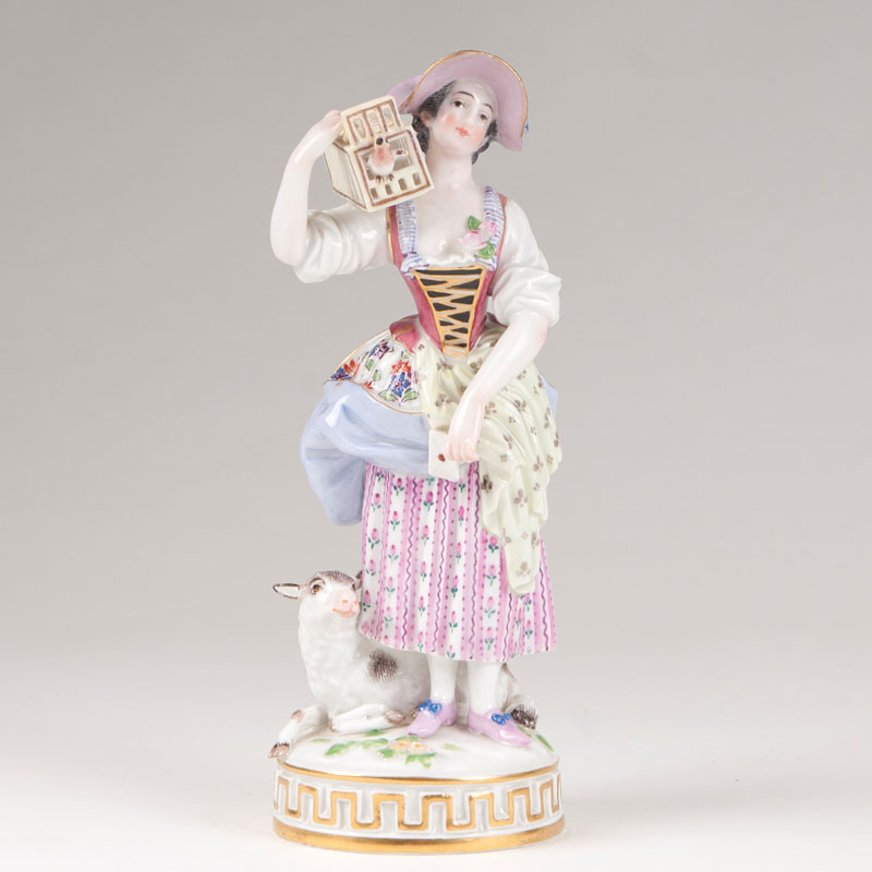 A porcelain figure 'Sheperdess with Birdcage'