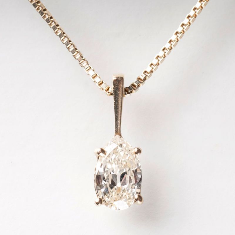 A solitaire diamond pendant with necklace