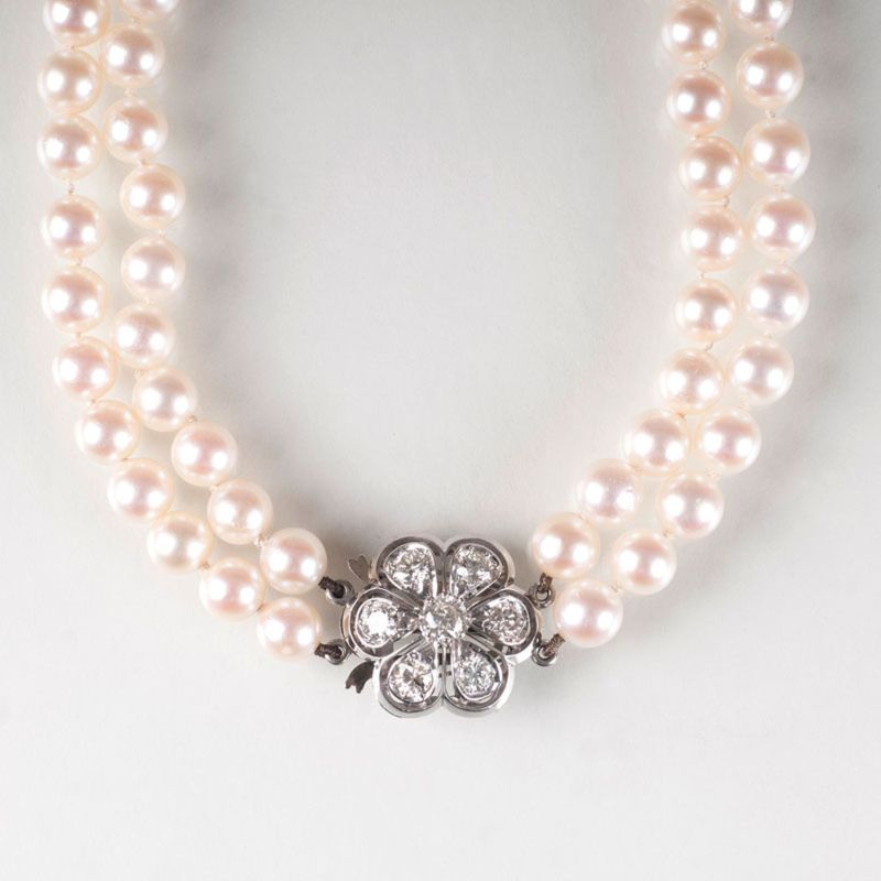 A pearl necklace with diamond clasp