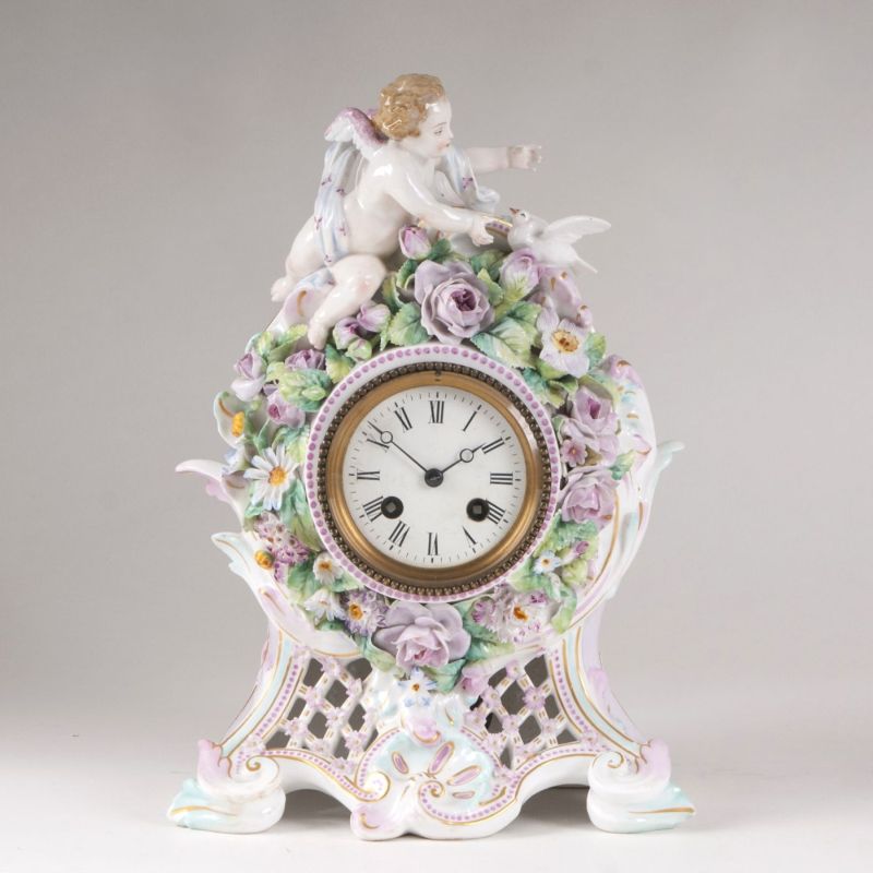 A porcelain mantel clock in rococo style