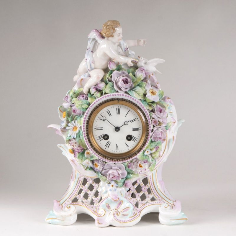 A porcelain mantel clock in rococo style