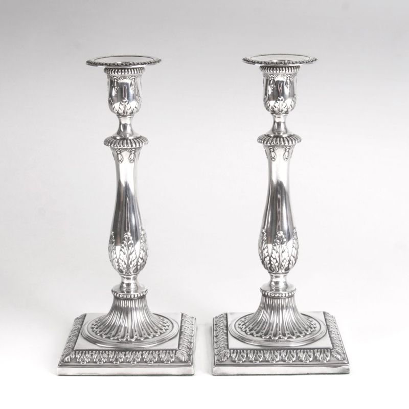 A pair of candleholders with canthus leafs