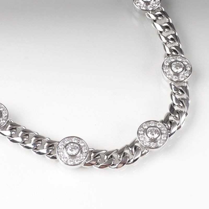 A curb chain necklace with diamonds