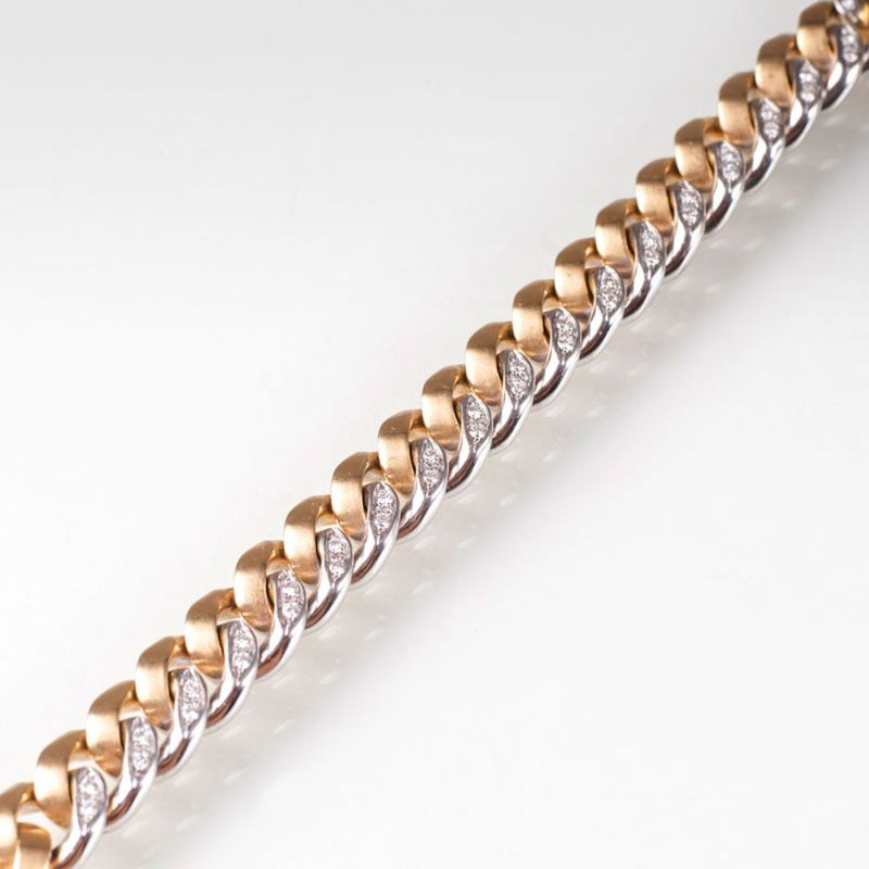 A multi coloured golden bracelet with diamonds A multi coloured golden bracelet with diamonds