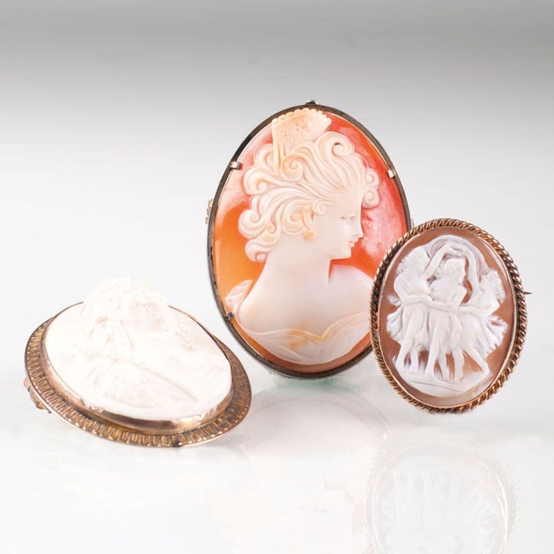 Three cameo brooches