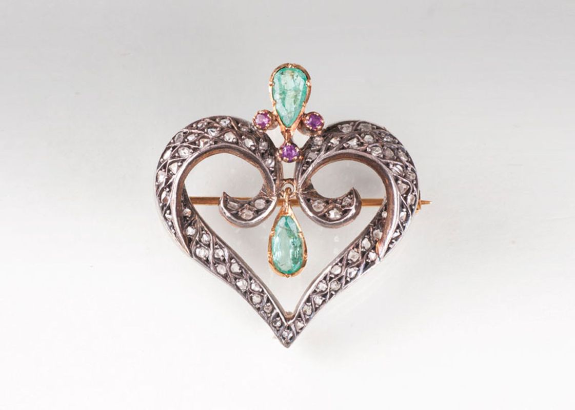 An antique emerald diamond brooch