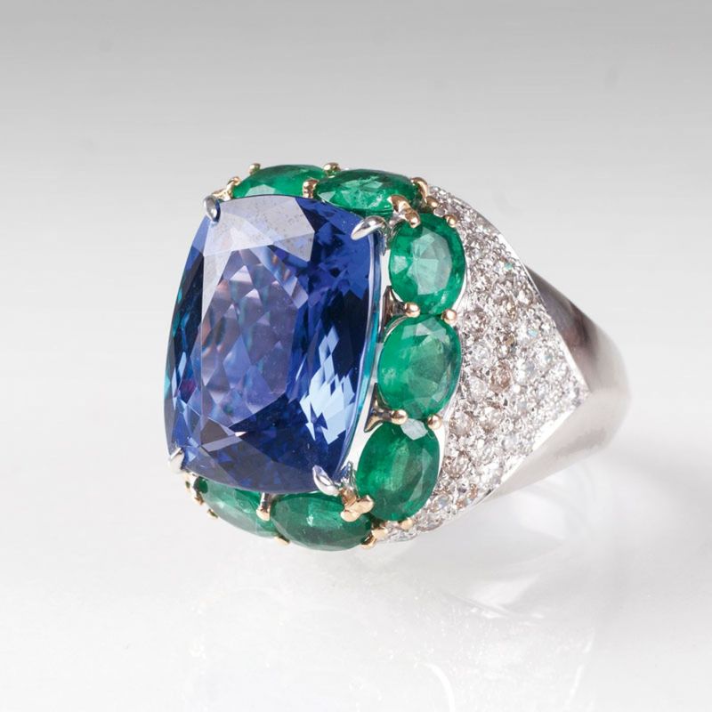 A splendid tanzanite emerald diamond ring
