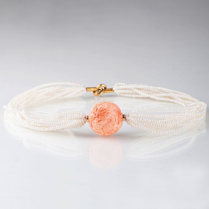 A pearl coral necklace