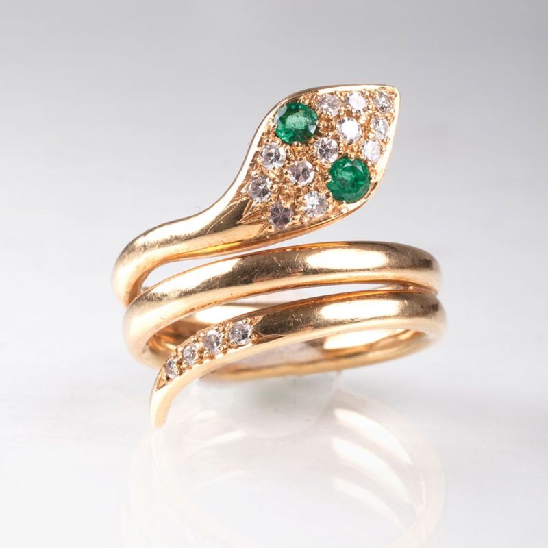 A Vintage goldring 'Snake' with diamonds and emeralds