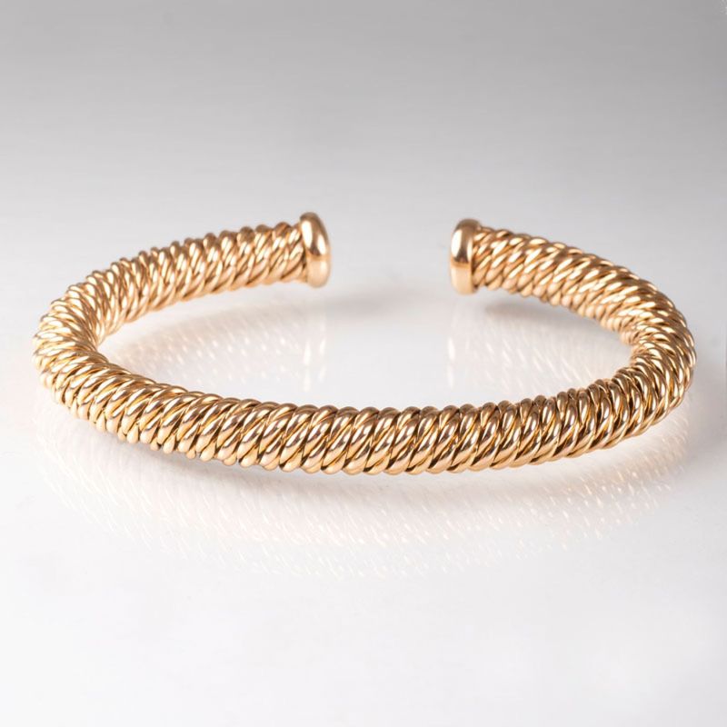 A gold bracelet by Péclard