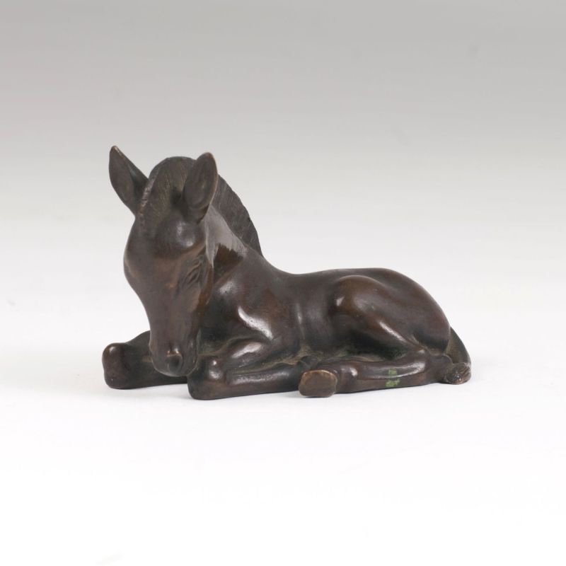 A small animal bronze 'Lying Foal'
