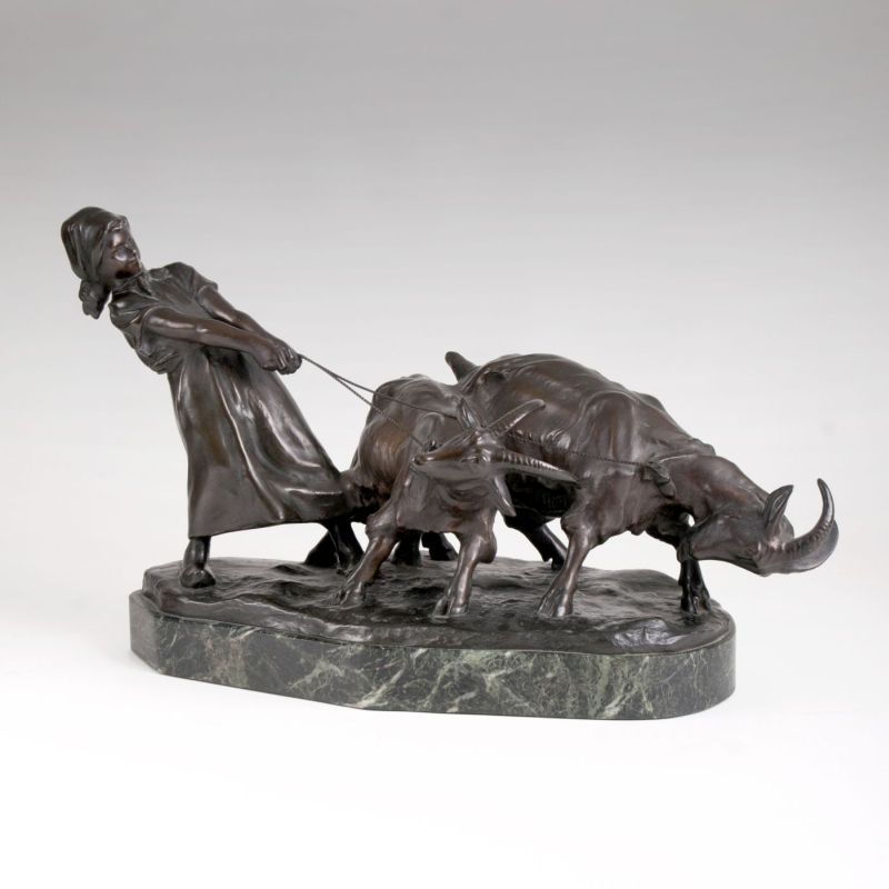 A bronze sculpture 'Girl with goats'