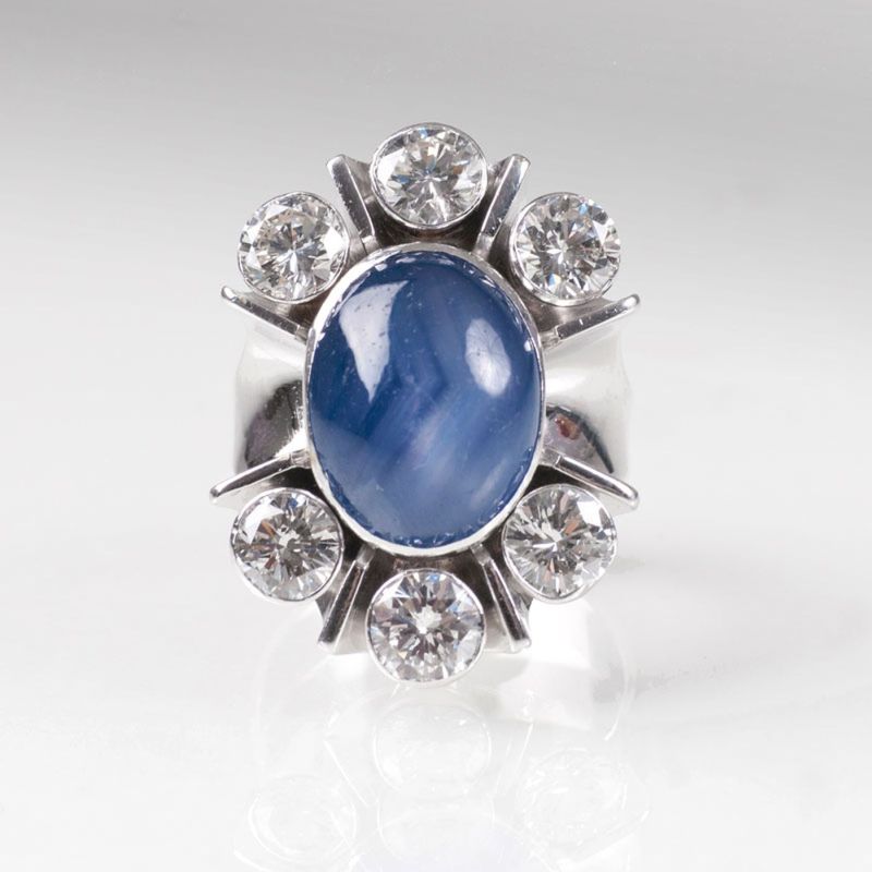 A star sapphire ring with diamonds