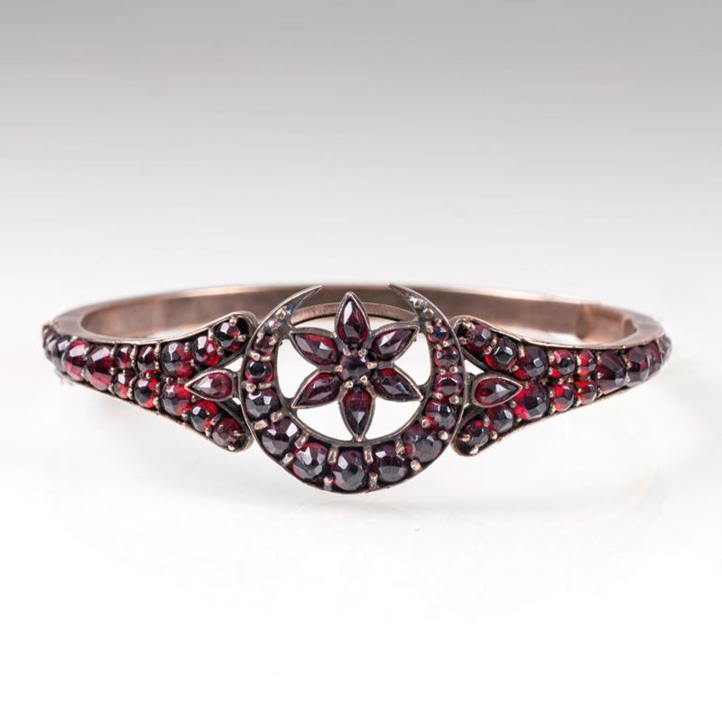 An antique garnet bangle bracelet