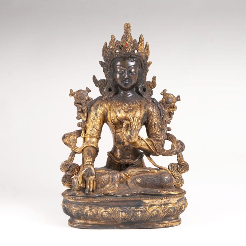 A bronze sculpture 'White Tara'