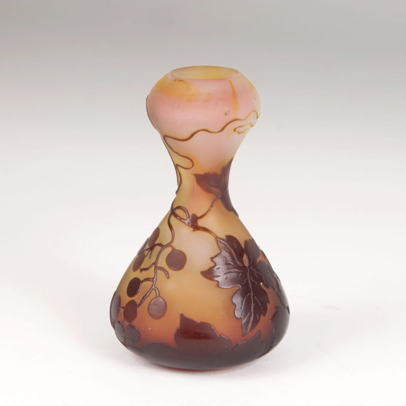 An Art Nouveau miniature vase with vine leaves