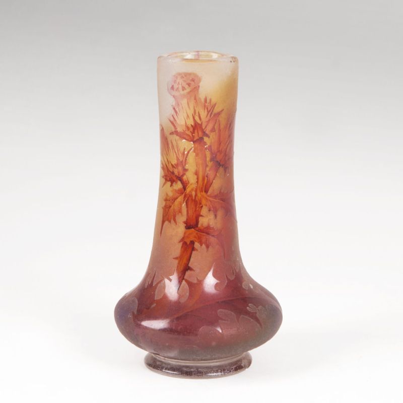 An Art Nouveau miniature vase with thistles