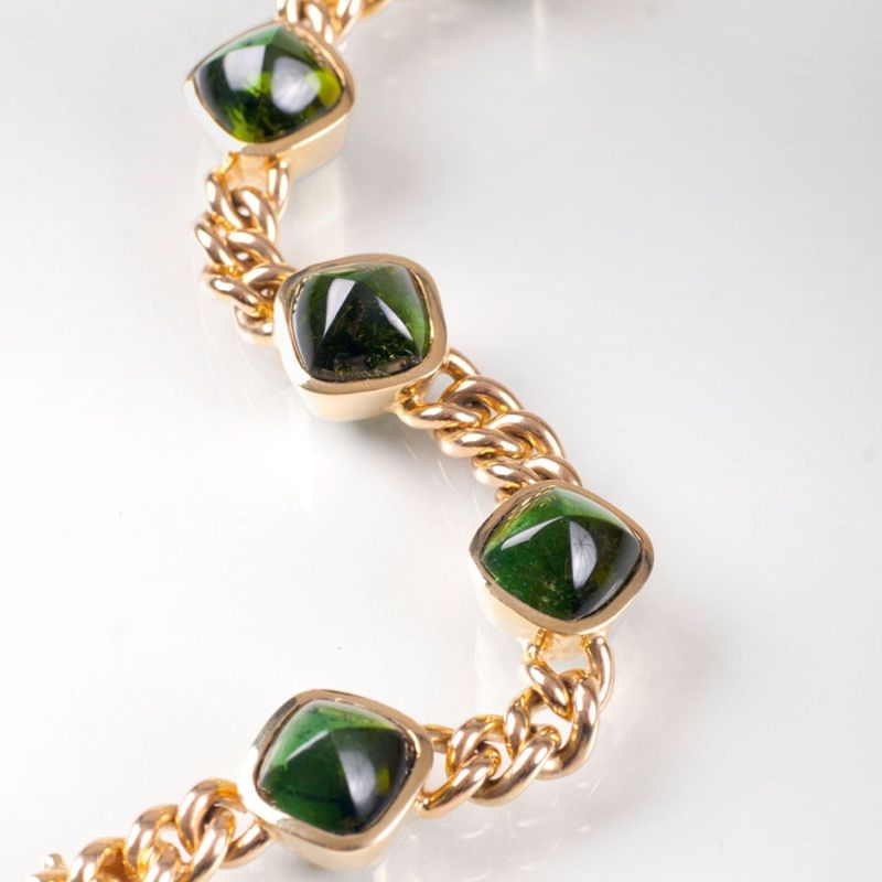A curb chain bracelet with tourmaline