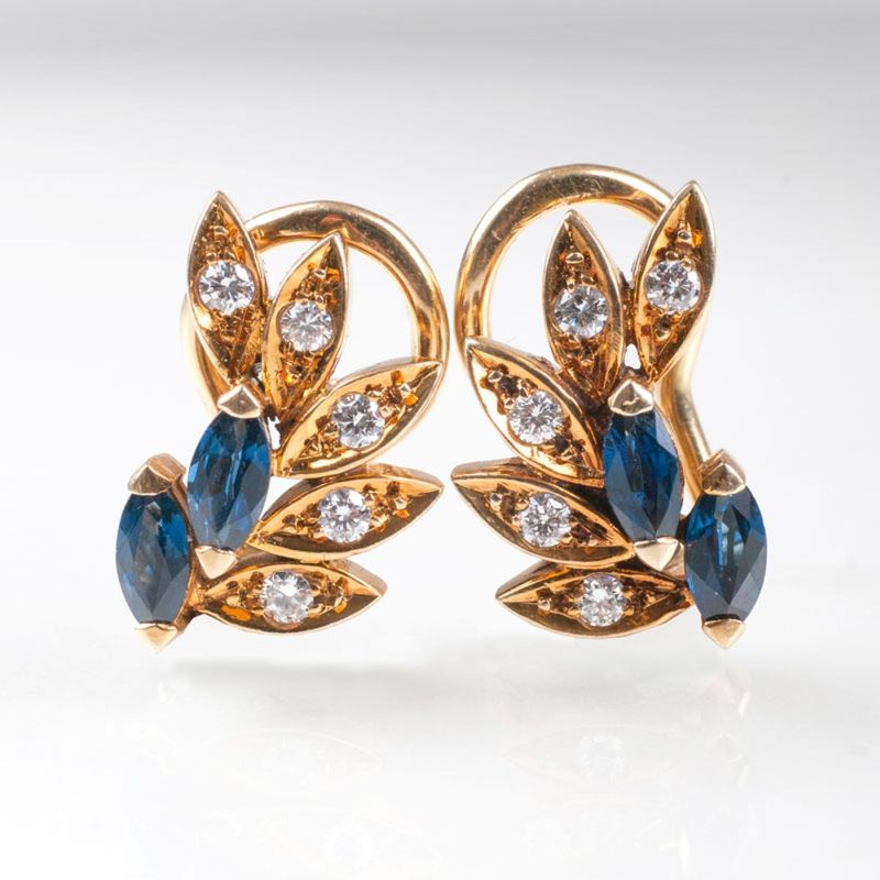 A pair of diamond sapphire earclips