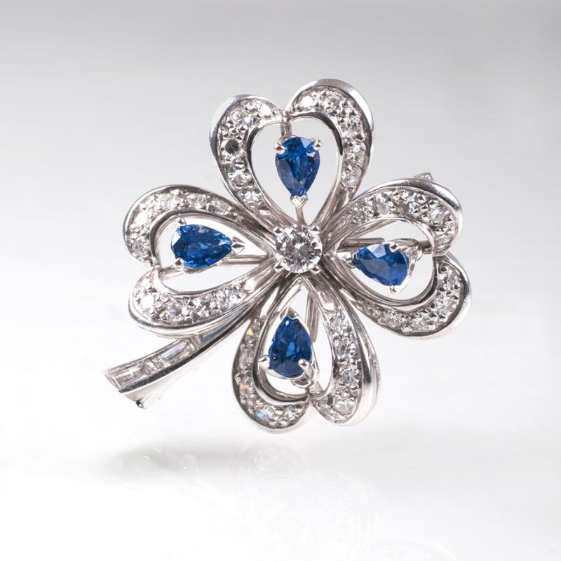 A small sapphire diamond brooch