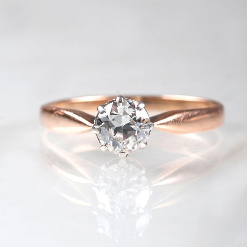 A petite Art Nouveau solitaire diamond ring