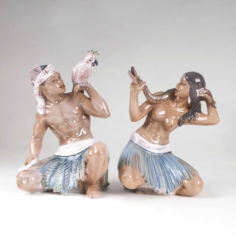 Two porcelain figures 'Snake charmer and Sudanese with cockatoo'