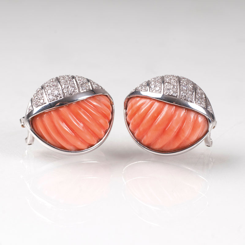 A pair of coral diamond earrings by Jeweller Wilm