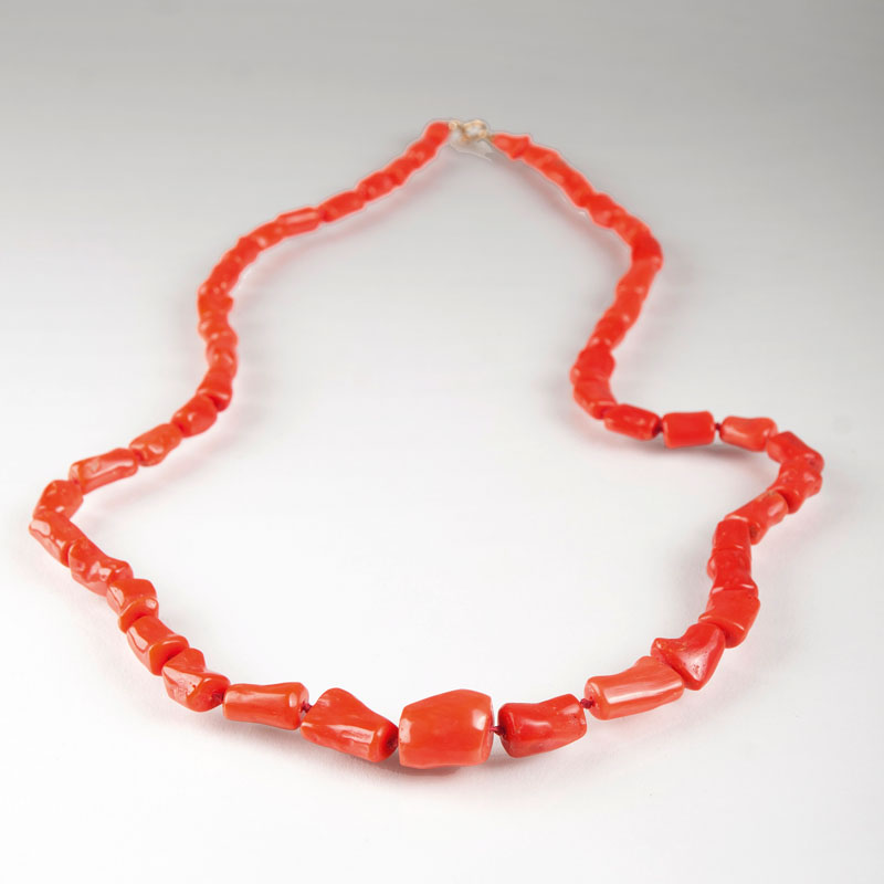 A long coral necklace