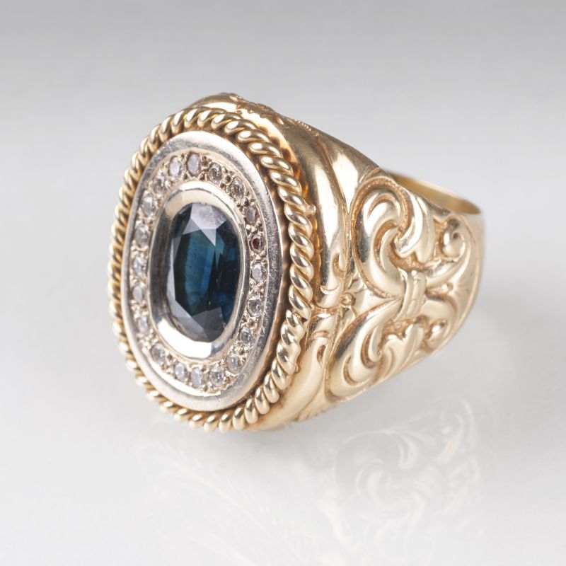 A large gentleman's sapphire diamond ring