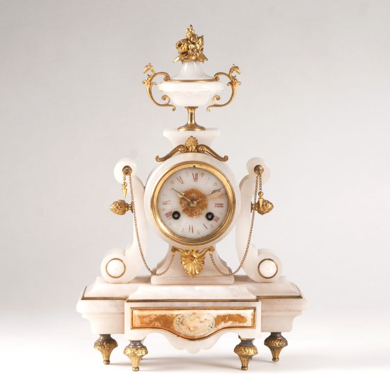 A Napoleon III Alabaster mantel clock