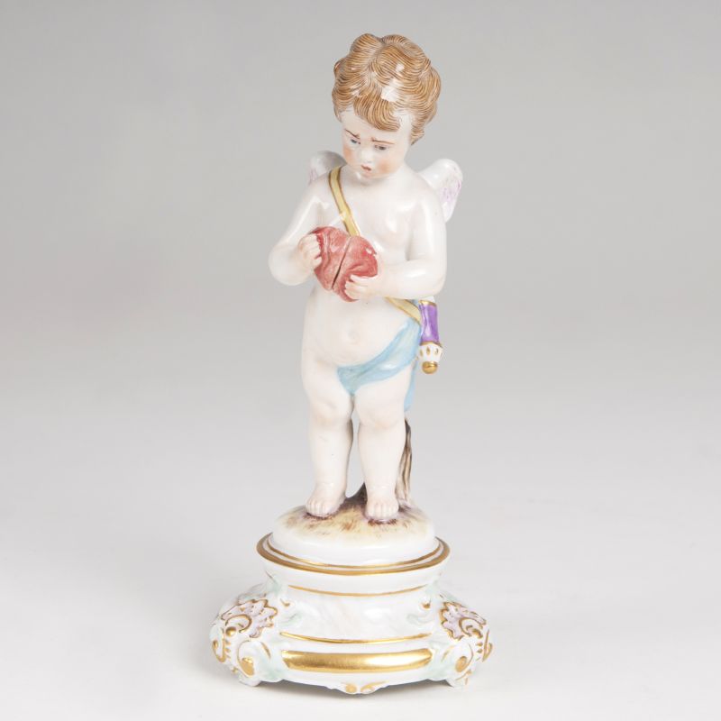 A porcelain figure 'Embarrassed Cupid'