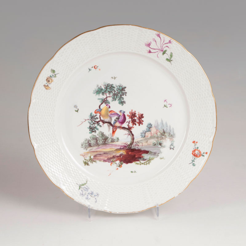 A porcelain plate with fine bird decor