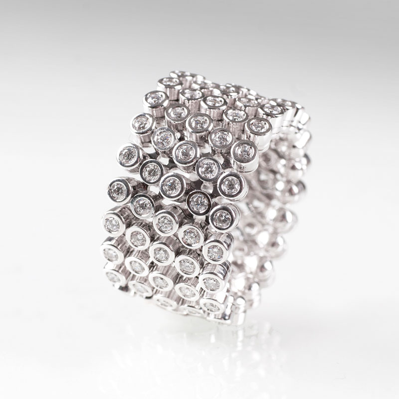 A modern diamond ring resp. bracelet by Jeweller Sönnichsen