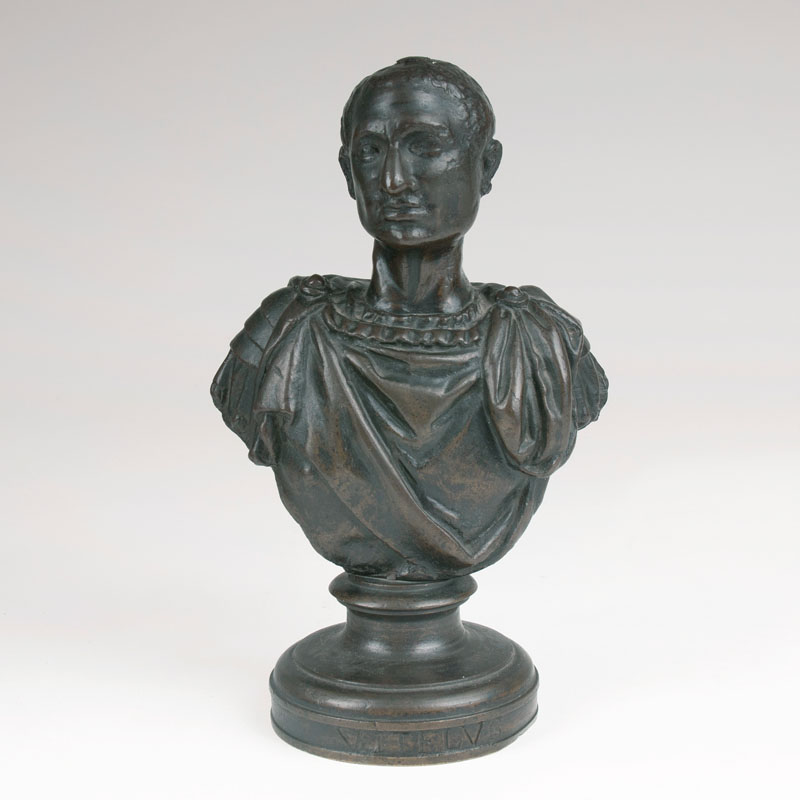 A small bronze bust of a Roman Emperor