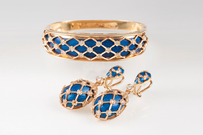 A Vintage bangle bracelet and a pair of earpendants with enamel and diamonds