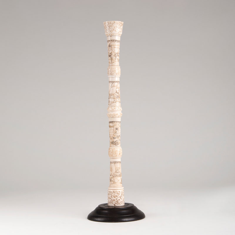 A Chinese ivory candlestick